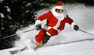 After a busy night Santa, a.k.a. Ted Allsopp, skis the slopes of Lake Louise Mountain Resort in  Lake Louise, Alta. on December 25 2005. (CP PHOTO/Calgary Sun - Al Charest)